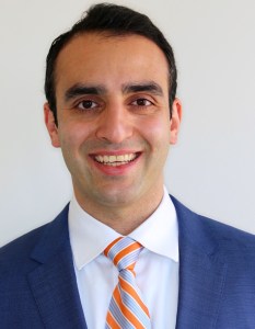 Headshot of Dr. Shahin Taghikhan wearing a suit and tie